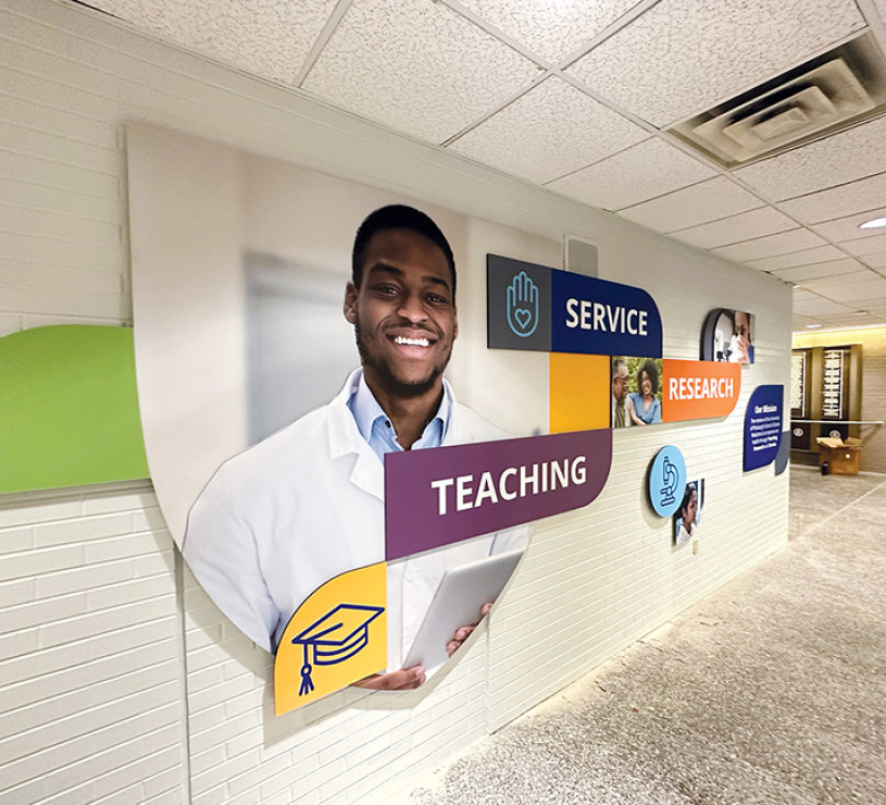 Dimensional signage displaying imagery to support vision statement for The University of Pittsburgh School of Dental Medicine