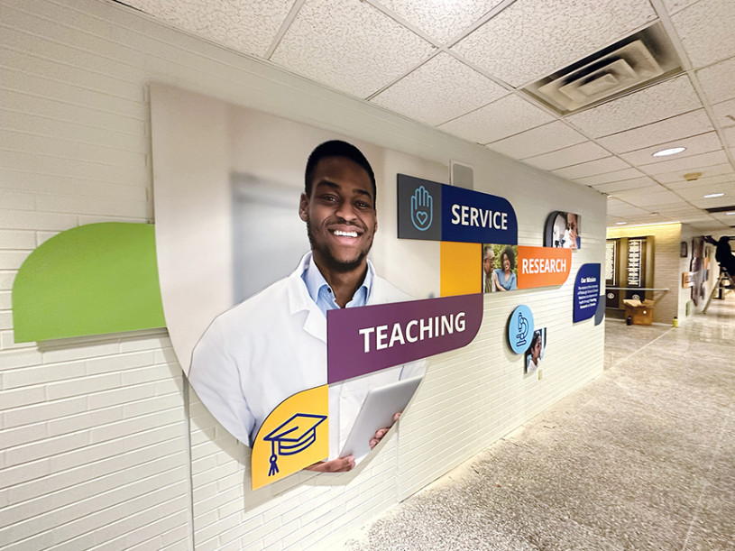 Dimensional signage displaying imagery to support vision statement for The University of Pittsburgh School of Dental Medicine